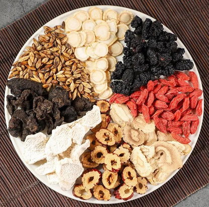 Brewed Eight Treasure Ginseng Tea in cup with golden color
